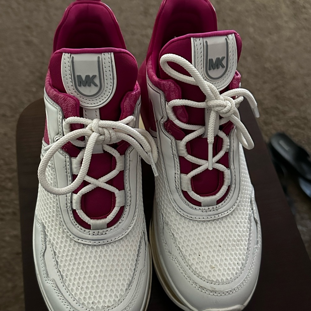Beautiful MK tennis shoes! Like new condition. Size 8.5